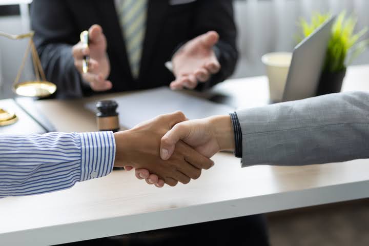 Business owner reviewing mediation versus arbitration options for resolving contract or partnership disputes privately and efficiently.