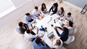 Employment law lawyers and HR professionals reviewing workplace policies, contracts, and compliance strategies to support business operations.