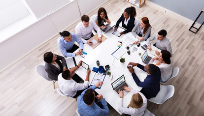 Employment law lawyers and HR professionals reviewing workplace policies, contracts, and compliance strategies to support business operations.
