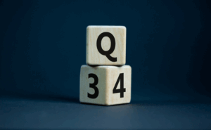 Wooden blocks with Q and numbers 3, 4.
