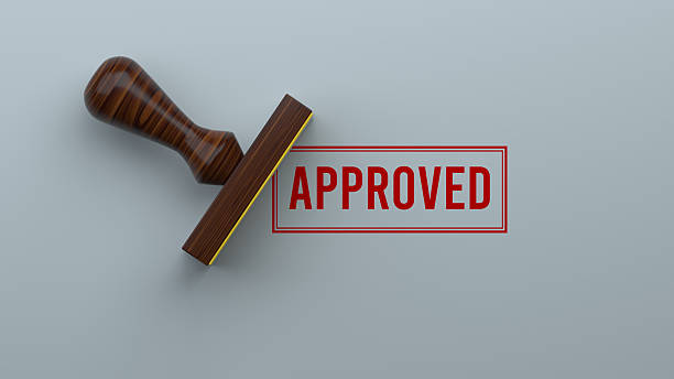 Rubber stamp with 'Approved' text, signifying when and when not to approve a franchisee