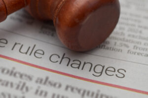 Finger pointing at rule changes text in document